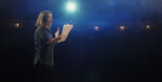 Photo of Woman Reading Script